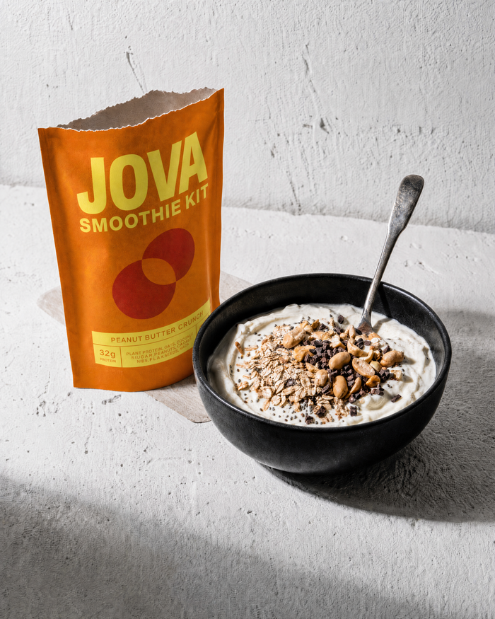 A bowl of yogurt topped with a JOVA smoothie kit